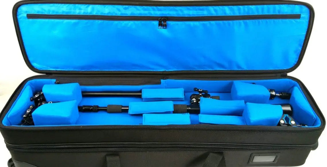 The Triad Shuttle Bag keeps two TRIAD-ORBIT stand systems safe and sound, to and from the gig with plenty of extra room for miscellaneous accessories. The Triad Shuttle Bag is a robustly constructed dual tier bag that allows the user to load and unload the bag with ease. Features Hard framed side walls Super strong, smooth rolling wheels Velcro hold downs Dual handles for easy loading 4 inner sidewall pocket Large lid pocket 2 accessory bags inside the lid pocket