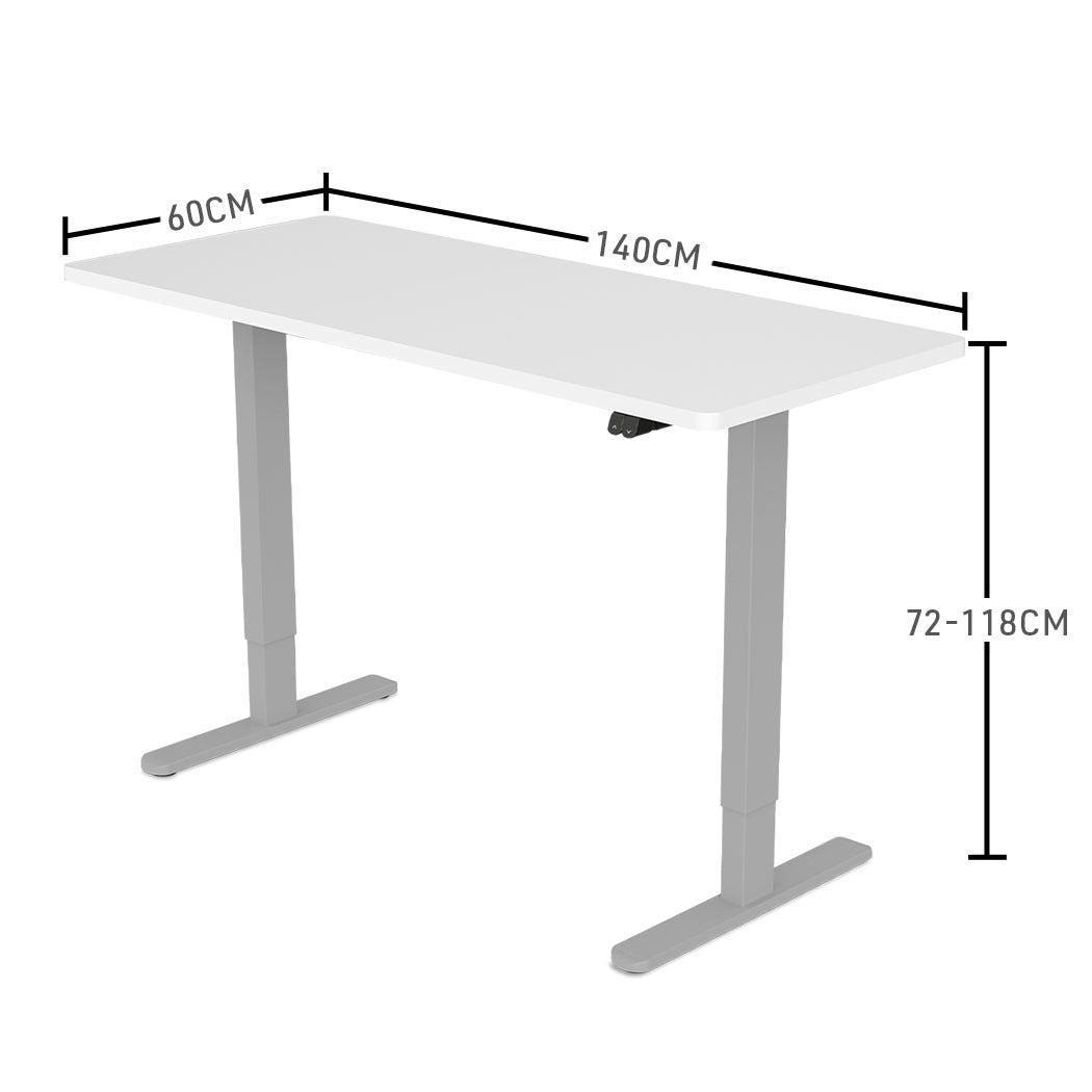 Fortia Sit To Stand Up Standing Desk, 140x60cm, 72-118cm Electric Height Adjustable, 70kg Load, White/Silver Frame